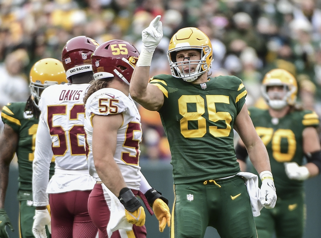 Oct 24, 2021; Green Bay, Wisconsin, USA;  Green Bay Packers tight end Robert Tonyan (85) reacts after catching a pass for a first down in the fourth quarter during the game against the Washington Football Team at Lambeau Field. Mandatory Credit: Benny Sieu-USA TODAY Sports