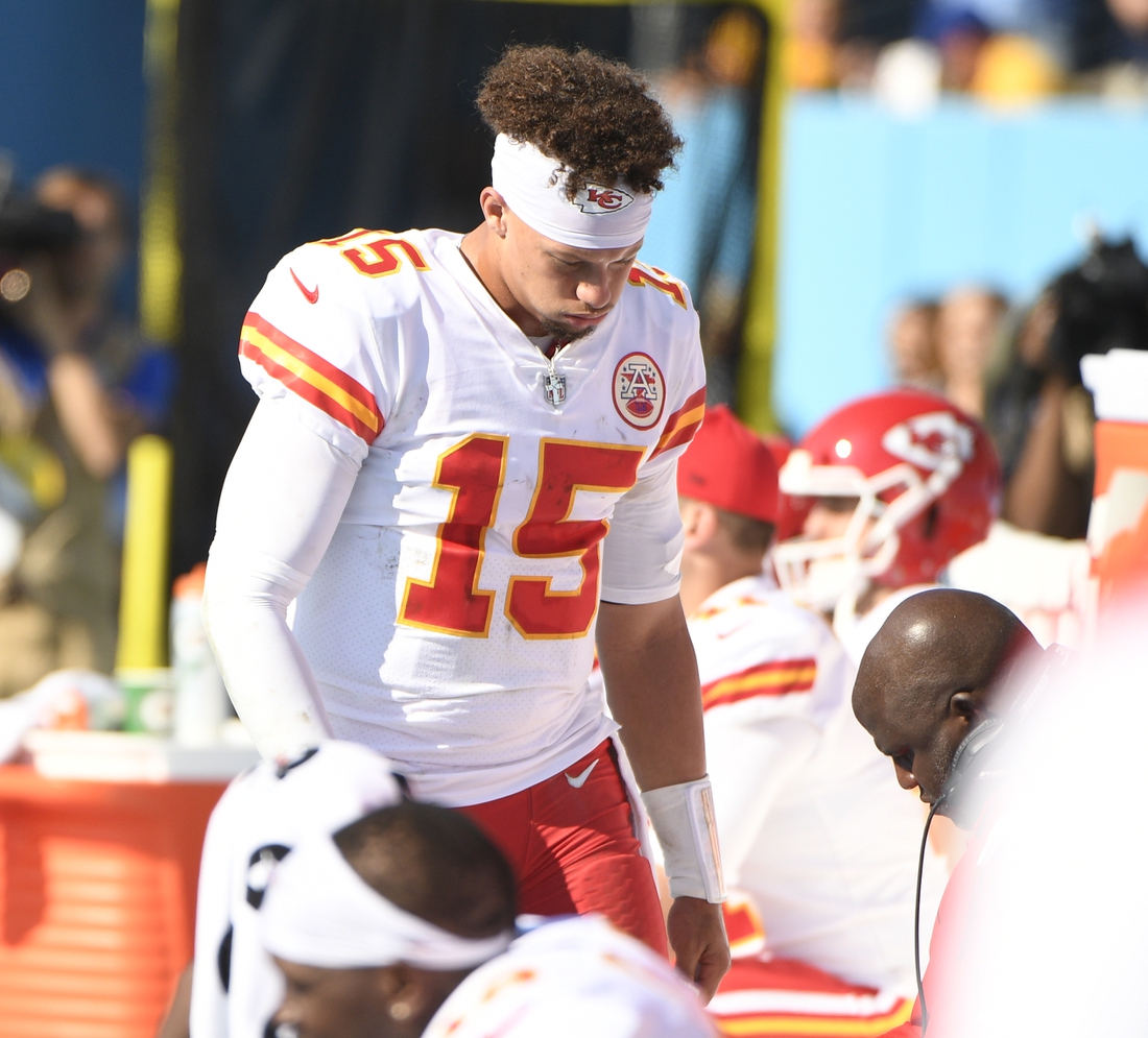 Oct 24, 2021; Nashville, Tennessee, USA;  Kansas City Chiefs quarterback Patrick Mahomes (15) reacts on the sideline against the Tennessee Titans during the second half at Nissan Stadium. Mandatory Credit: Steve Roberts-USA TODAY Sports