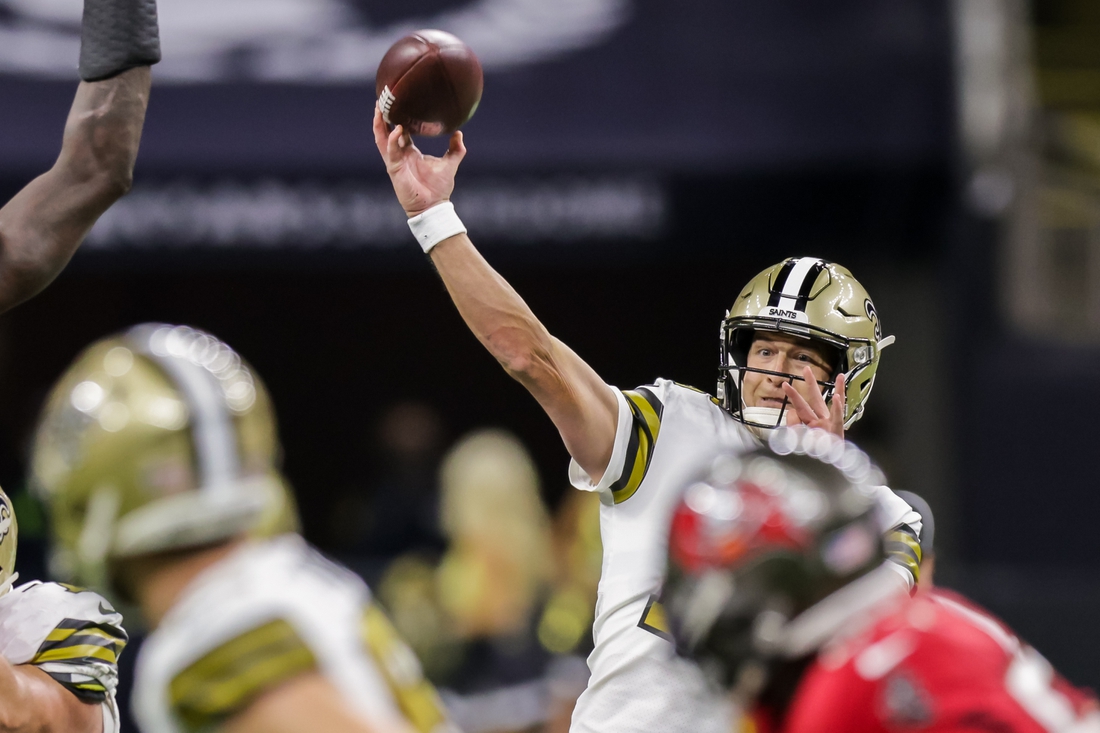 Oct 31, 2021; New Orleans, Louisiana, USA;  New Orleans Saints quarterback Trevor Siemian (15) passes there ball against Tampa Bay Buccaneers during the first half at Caesars Superdome. Mandatory Credit: Stephen Lew-USA TODAY Sports