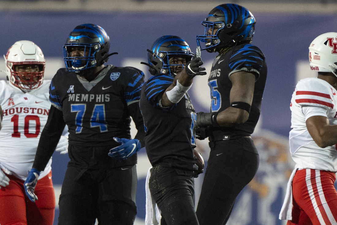Dec 12, 2020; Memphis, Tennessee, USA; Memphis Tigers running back Kylan Watkins (17) celebrates during the second half against the Houston Cougars at Liberty Bowl Memorial Stadium. Mandatory Credit: Justin Ford-USA TODAY Sports