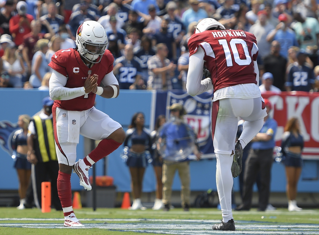 Sep 12, 2021; Nashville, Tennessee, USA;  Arizona Cardinals quarterback Kyler Murray (1) celebrates his touchdown with wide receiver DeAndre Hopkins (10) against the Tennessee Titans during the first half at Nissan Stadium. Mandatory Credit: Steve Roberts-USA TODAY Sports