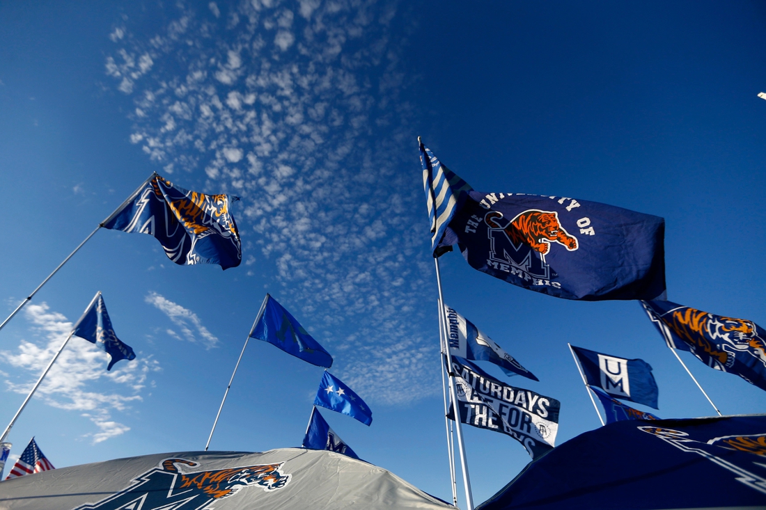 Oct. 19, 2019 - University of Memphis flags dot the sky outside of the stadium before Memphis takes on Tulane at Liberty Bowl Memorial Stadium.

H6w7063