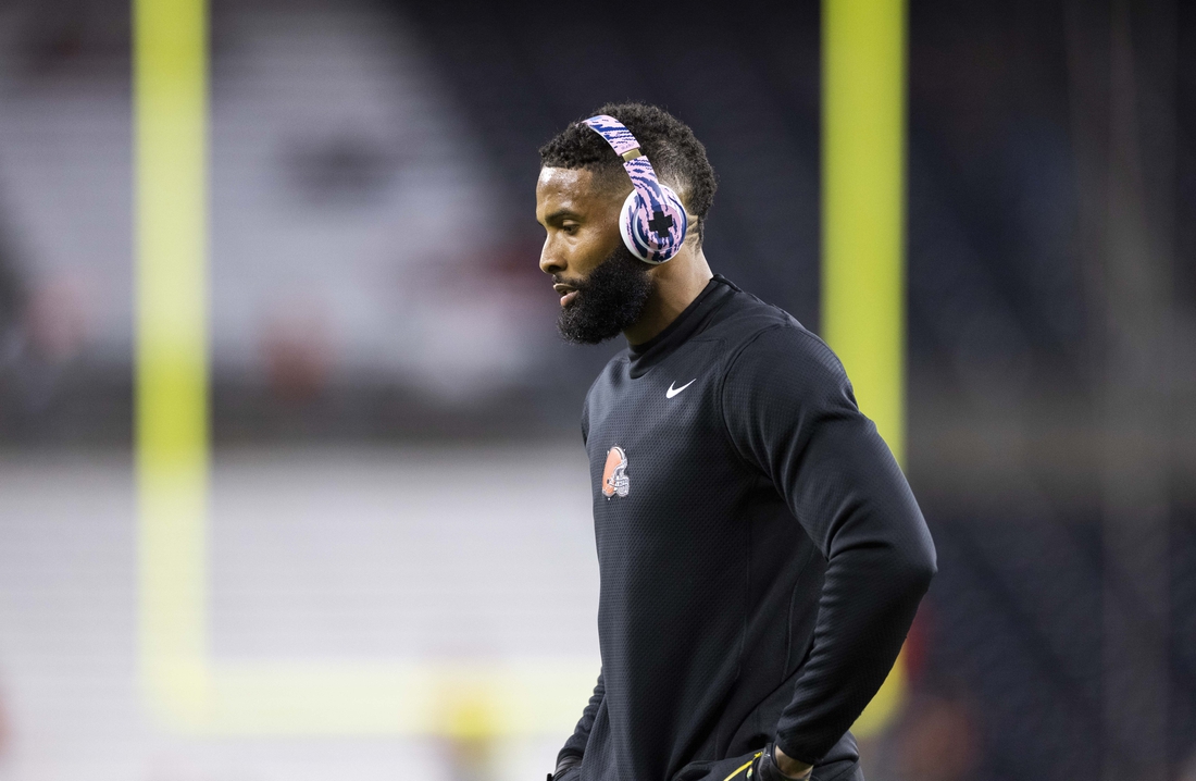 Oct 21, 2021; Cleveland, Ohio, USA; Cleveland Browns wide receiver Odell Beckham Jr. (13) walks on the field during warmups before the game against the Denver Broncos at FirstEnergy Stadium. Mandatory Credit: Scott Galvin-USA TODAY Sports