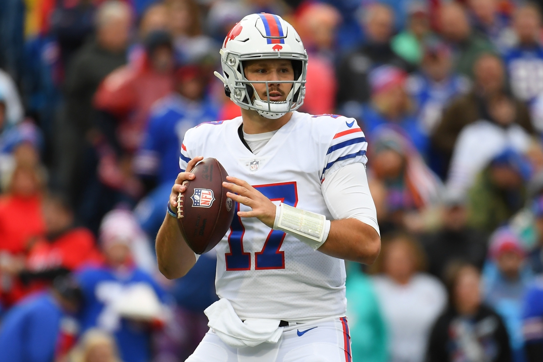 Oct 31, 2021; Orchard Park, New York, USA; Buffalo Bills quarterback Josh Allen (17) drops back to pass against the Miami Dolphins during the second half at Highmark Stadium. Mandatory Credit: Rich Barnes-USA TODAY Sports