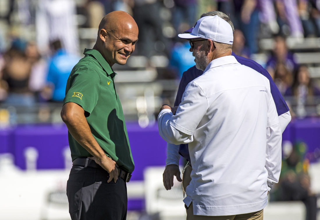 Nov 6, 2021; Fort Worth, Texas, USA;  TCU Horned Frogs interim head coach Jerry Kill chats with Baylor head coach Dave Aranda before the game at Amon G. Carter Stadium. Mandatory Credit: Kevin Jairaj-USA TODAY Sports