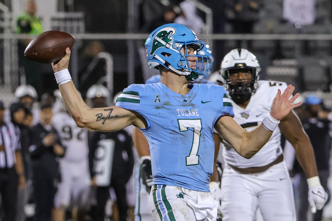 Nov 6, 2021; Orlando, Florida, USA; Tulane Green Wave quarterback Michael Pratt (7) throws a pass against the UCF Knights during the second half at Bounce House. Mandatory Credit: Mike Watters-USA TODAY Sports