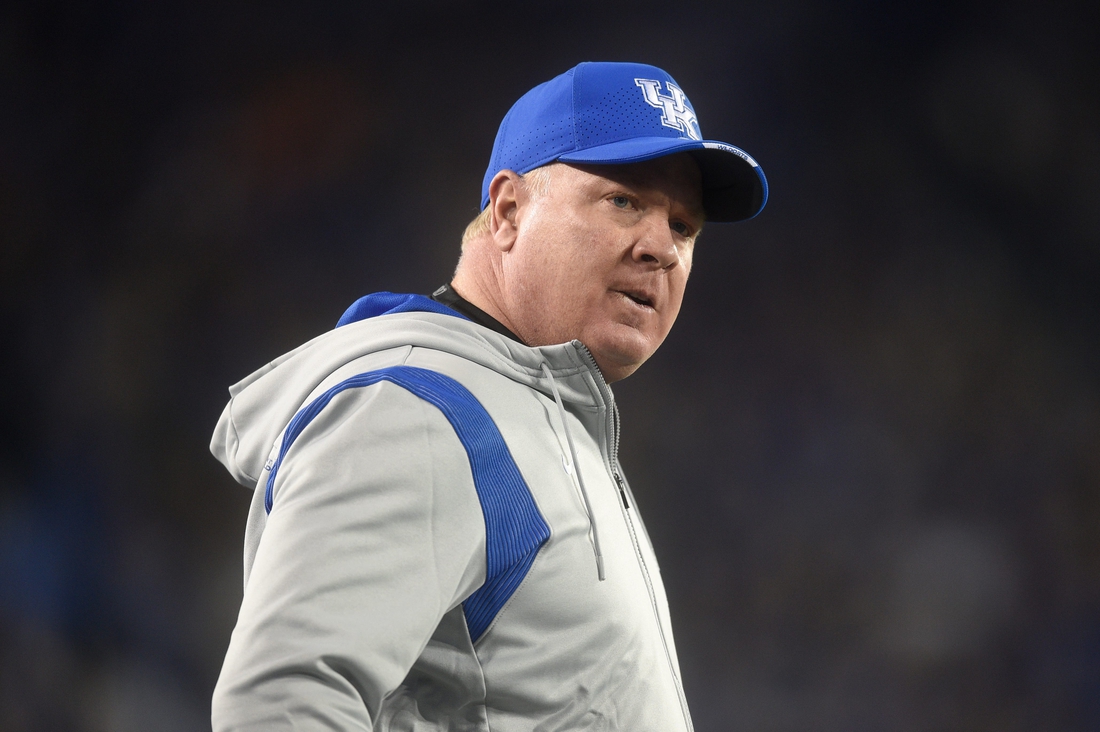 Kentucky Head Coach Mark Stoops speaks to officials during an SEC football game between the Tennessee Volunteers and the Kentucky Wildcats at Kroger Field in Lexington, Ky. on Saturday, Nov. 6, 2021.

Tennvskentucky1106 1251