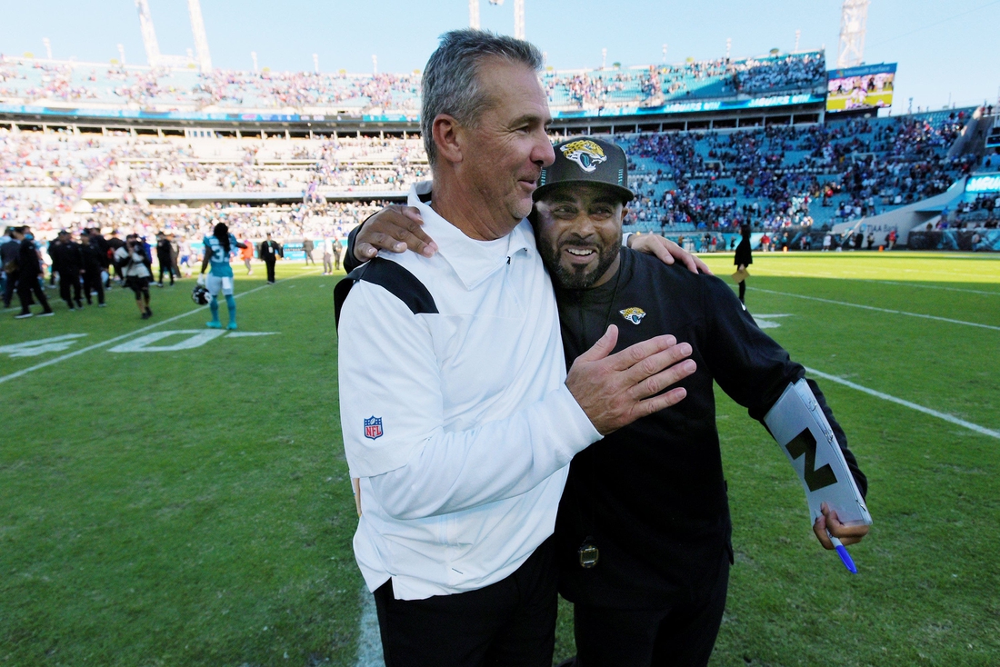Offensive Quality Control Coach Quinton Ganther gives Jaguars head coach Urban Meyer a hug as they leave the field after Sunday's victory over the Bills. The Jaguars were tied with the Bills 6 to 6 at the end of the first half and went on to win the game with a final score of 9 to 6. The Jacksonville Jaguars hosted the Buffalo Bills at TIAA Bank Field in Jacksonville, FL, Sunday, November 7, 2021. [Bob Self/Florida Times-Union]

Jki 110721 Bsjagsvsbuffalo 20