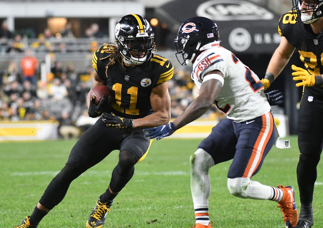 Nov 8, 2021; Pittsburgh, Pennsylvania, USA;  Pittsburgh Steelers wide receiver Chase Claypool (11) runs in the fourth quarter by Chicago Bears defensive back Kindle Vildor (22) at Heinz Field. The Steelers won 29-27. Mandatory Credit: Philip G. Pavely-USA TODAY Sports