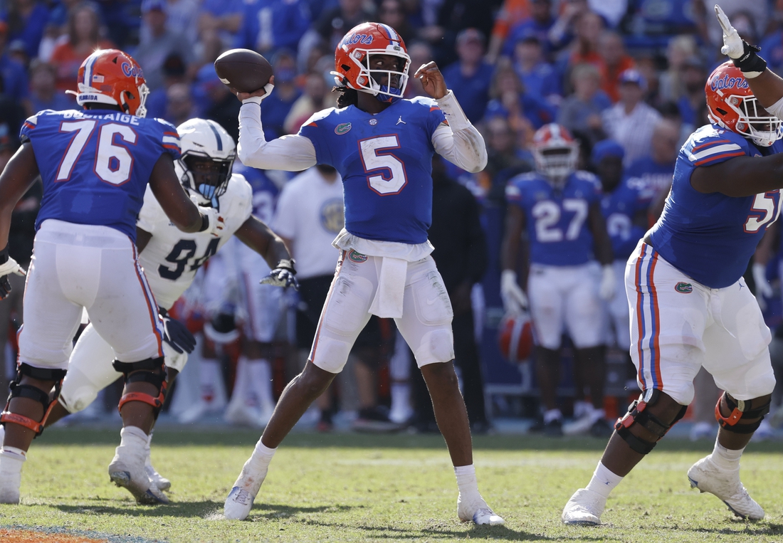 Nov 13, 2021; Gainesville, Florida, USA; Florida Gators quarterback Emory Jones (5) throws the ball against the Samford Bulldogs during the second half at Ben Hill Griffin Stadium. Mandatory Credit: Kim Klement-USA TODAY Sports