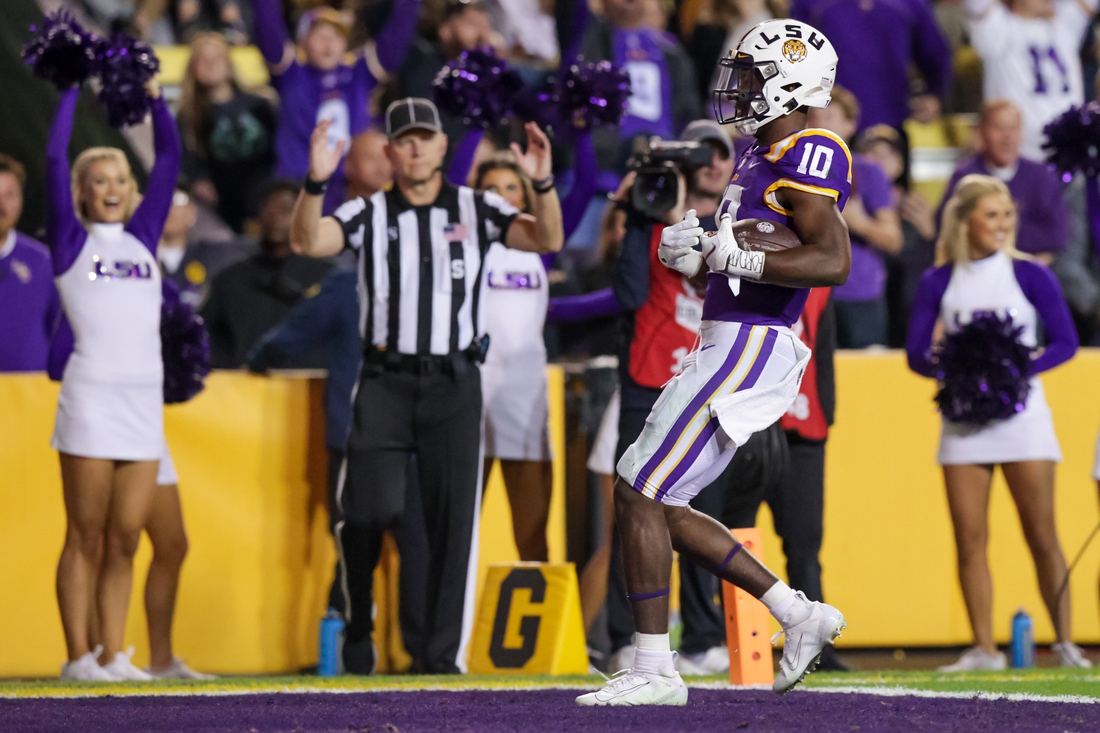 Nov 20, 2021; Baton Rouge, Louisiana, USA; LSU Tigers wide receiver Jaray Jenkins (10) scores a touchdown that   s is called back due to a penalty when playing against Louisiana Monroe Warhawks during the first half at Tiger Stadium. Mandatory Credit: Stephen Lew-USA TODAY Sports