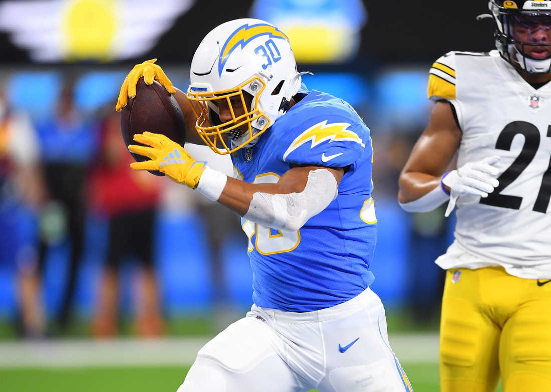 Nov 21, 2021; Inglewood, California, USA; Los Angeles Chargers running back Austin Ekeler (30) celebrates after scoring a touchdown in the first half of the game against the Pittsburgh Steelers at SoFi Stadium. Mandatory Credit: Jayne Kamin-Oncea-USA TODAY Sports