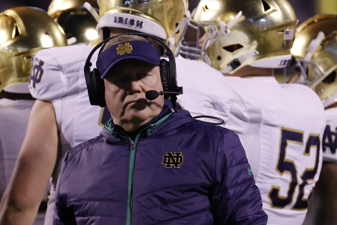 Nov 13, 2021; Charlottesville, Virginia, USA; Notre Dame Fighting Irish head coach Brian Kelly stands on the sidelines against the Virginia Cavaliers at Scott Stadium. Mandatory Credit: Geoff Burke-USA TODAY Sports