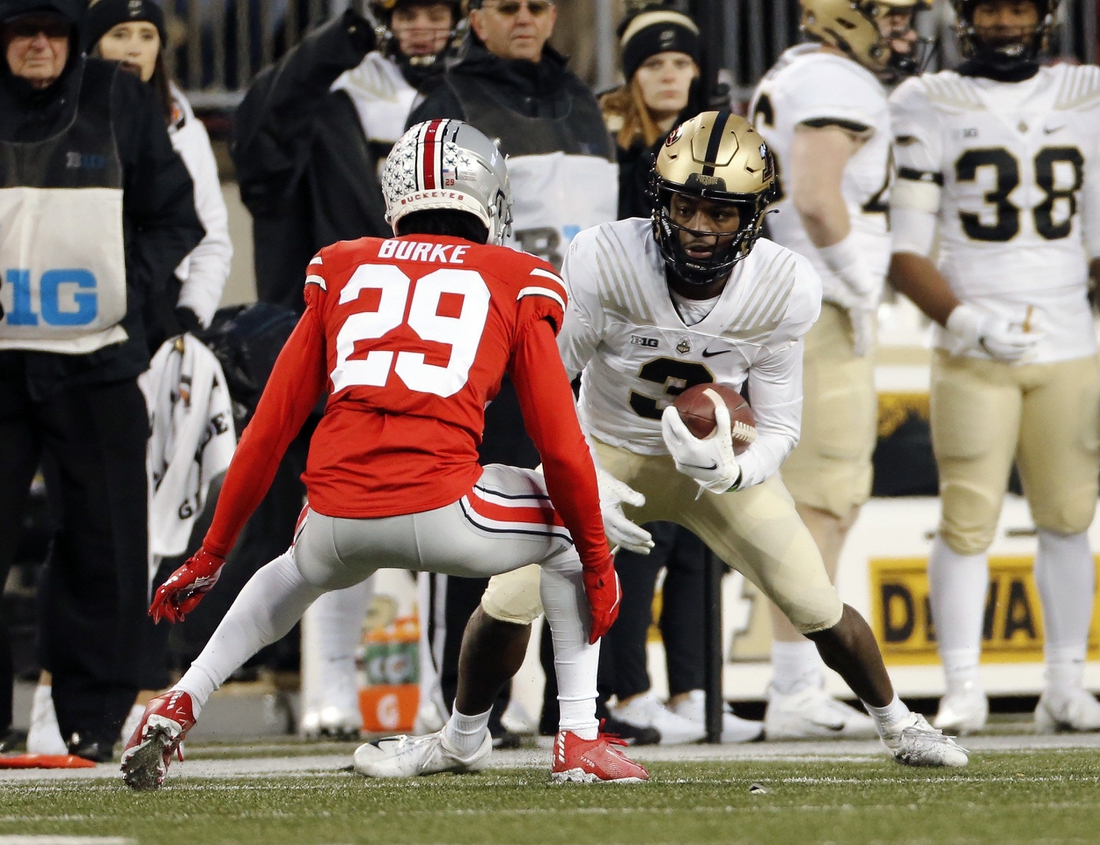 Purdue Boilermakers wide receiver David Bell (3) makes a catch against Ohio State Buckeyes cornerback Denzel Burke (29) during the 2nd quarter of their NCAA game at Ohio Stadium in Columbus, Ohio on November 13, 2021.

Osu21pur Kwr 31