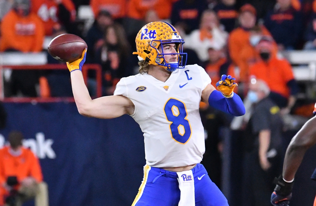 Nov 27, 2021; Syracuse, New York, USA; Pittsburgh Panthers quarterback Kenny Pickett (8) throws a pass in the second quarter against the Syracuse Orange at the Carrier Dome. Mandatory Credit: Mark Konezny-USA TODAY Sports