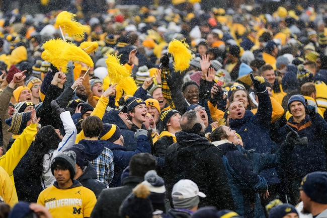Michigan fans rush the field after the Wolverines defeat Ohio State 42-27 at Michigan Stadium in Ann Arbor on Nov. 27, 2021.

Secondary 11272021 Umosu2h 47