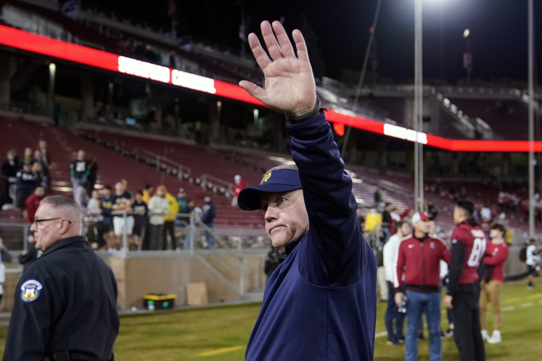 Nov 27, 2021; Stanford, California, USA; Notre Dame Fighting Irish head coach Brian Kelly walks off the field after the game against the Stanford Cardinal at Stanford Stadium. Mandatory Credit: Darren Yamashita-USA TODAY Sports