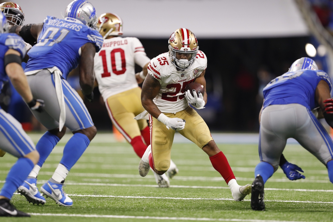 Sep 12, 2021; Detroit, Michigan, USA; San Francisco 49ers running back Elijah Mitchell (25) runs with the ball against the Detroit Lions during the fourth quarter at Ford Field. Mandatory Credit: Raj Mehta-USA TODAY Sports
