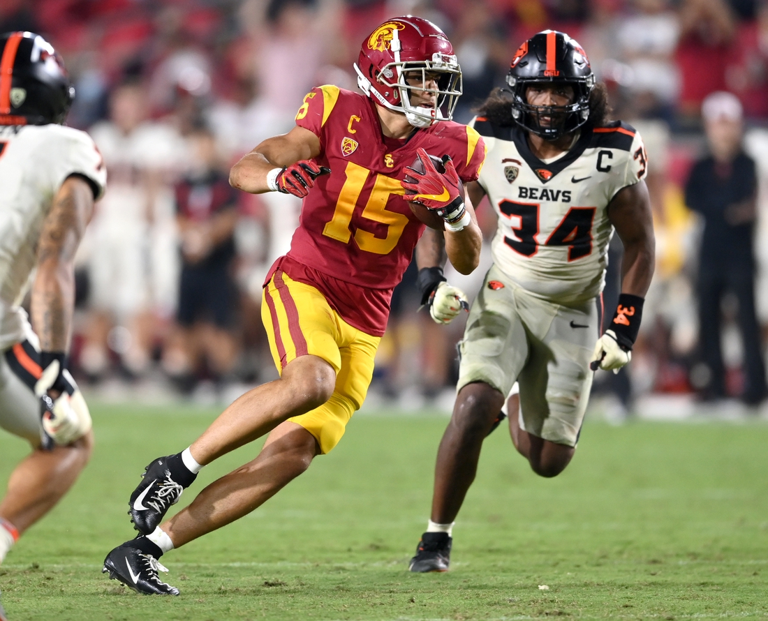 Sep 25, 2021; Los Angeles, California, USA; USC Trojans wide receiver Drake London (15) runs the ball after a complete pass in the second half of the game at United Airlines Field at Los Angeles Memorial Coliseum. Mandatory Credit: Jayne Kamin-Oncea-USA TODAY Sports
