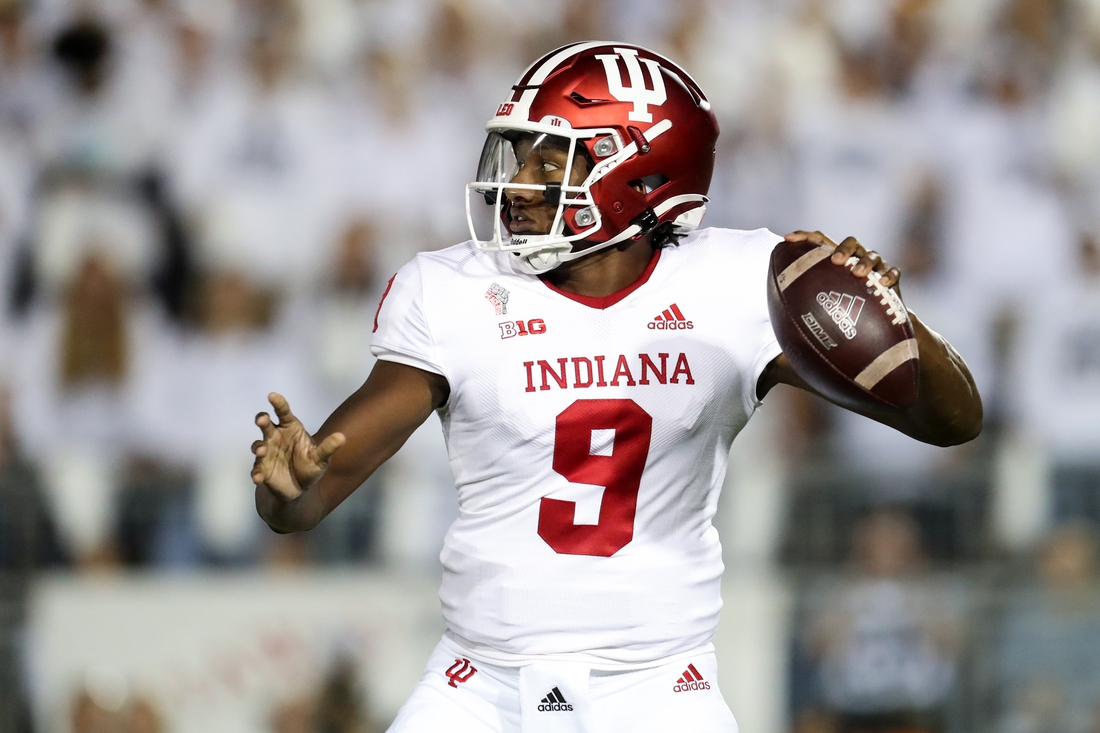 Oct 2, 2021; University Park, Pennsylvania, USA; Indiana Hoosiers quarterback Michael Penix Jr. (9) drops back to throw a pass against the Penn State Nittany Lions during the first quarter at Beaver Stadium. Mandatory Credit: Matthew OHaren-USA TODAY Sports