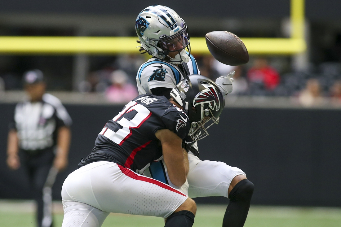 Oct 31, 2021; Atlanta, Georgia, USA; Atlanta Falcons free safety Erik Harris (23) breaks up a pass intended for Carolina Panthers wide receiver Robby Anderson (11) in the second half at Mercedes-Benz Stadium. Mandatory Credit: Brett Davis-USA TODAY Sports
