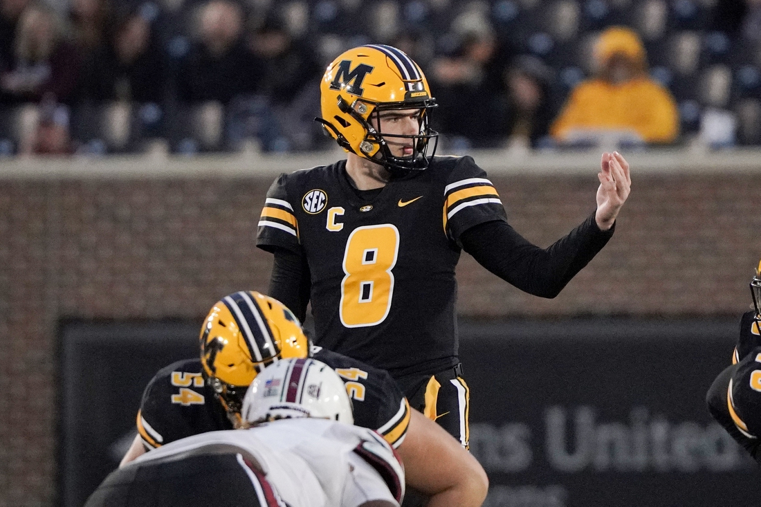 Nov 13, 2021; Columbia, Missouri, USA; Missouri Tigers quarterback Connor Bazelak (8) gestures at the line of scrimmage against the South Carolina Gamecocks during the second half at Faurot Field at Memorial Stadium. Mandatory Credit: Denny Medley-USA TODAY Sports