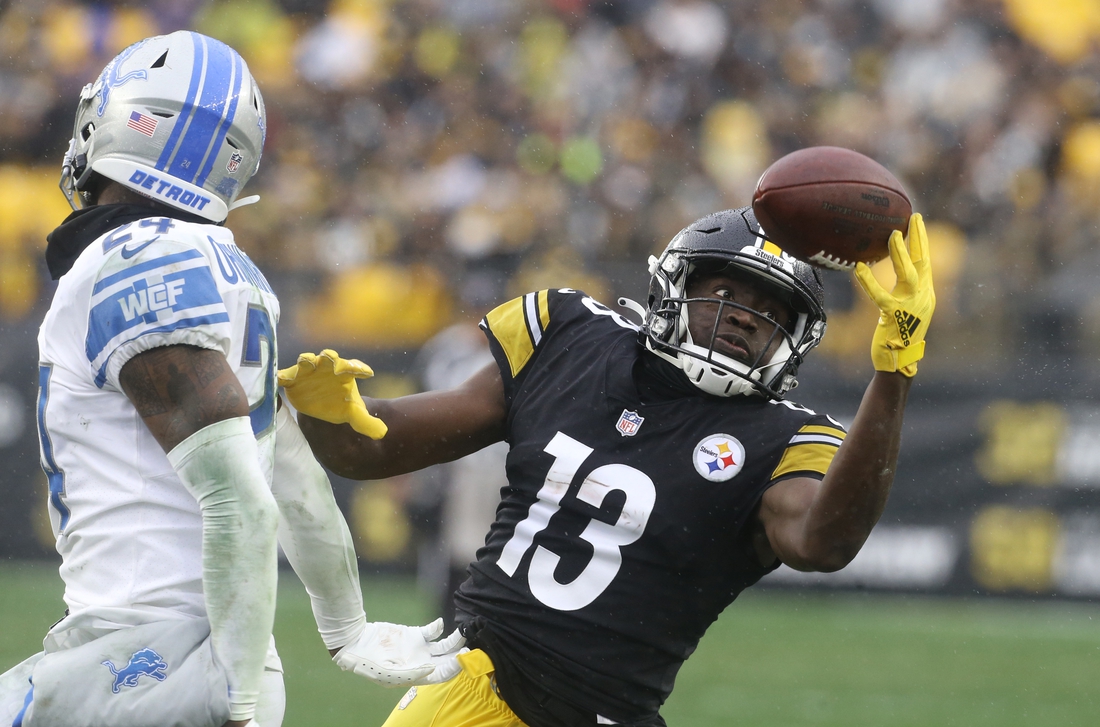Nov 14, 2021; Pittsburgh, Pennsylvania, USA;  Pittsburgh Steelers wide receiver James Washington (13) can not catch a pass as Detroit Lions cornerback Amani Oruwariye (24) defends during the third quarter  at Heinz Field. The game ended in a 16-16 tie. Mandatory Credit: Charles LeClaire-USA TODAY Sports