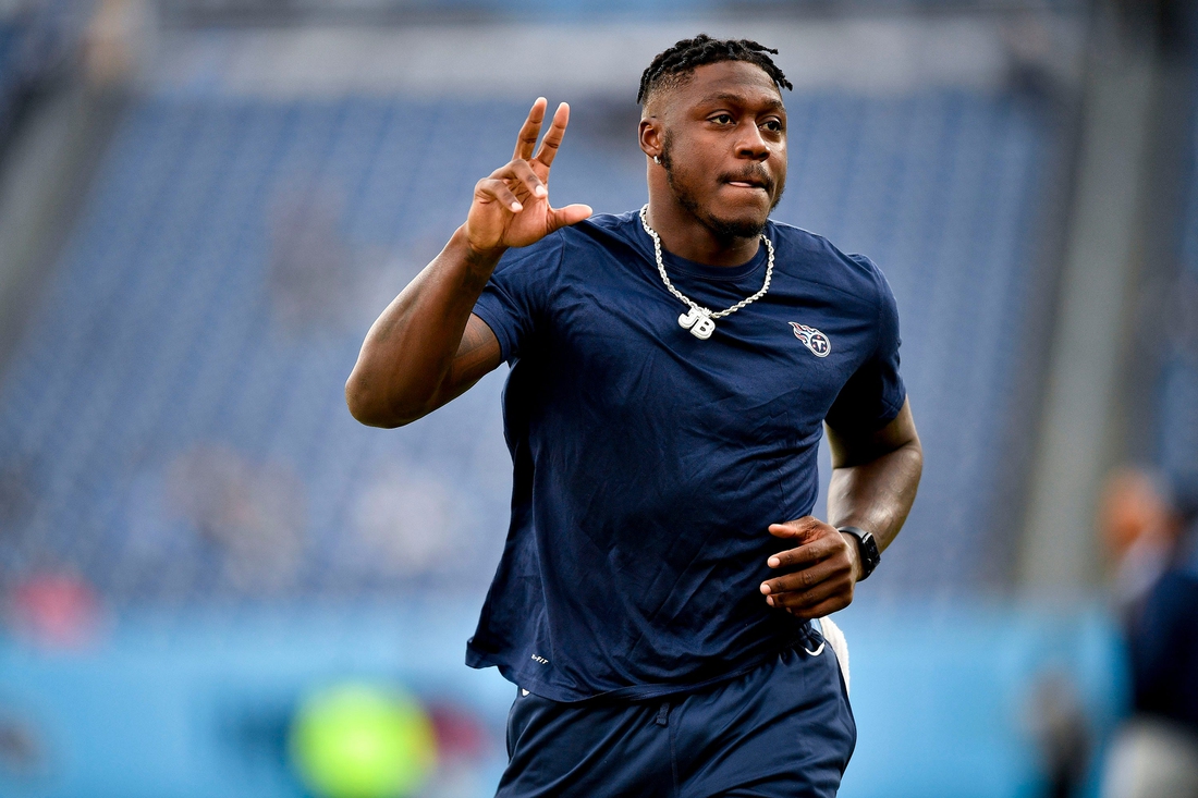 Tennessee Titans wide receiver A.J. Brown (11) runs on the field during warmups before they face the Texans at Nissan Stadium Sunday, Nov. 21, 2021 in Nashville, Tenn.

Titans Texans 0100