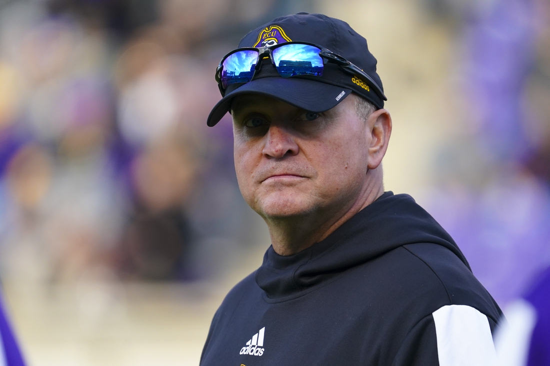 Nov 26, 2021; Greenville, North Carolina, USA;  East Carolina Pirates head coach Mike Houston looks on before the game against the Cincinnati Bearcats at Dowdy-Ficklen Stadium. Mandatory Credit: James Guillory-USA TODAY Sports