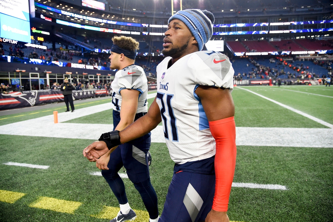 Tennessee Titans free safety Kevin Byard (31) and cornerback Elijah Molden (24) leave the field after losing to the Patriots at Gillette Stadium Sunday, Nov. 28, 2021 in Foxborough, Mass.

Titans Patriots 129