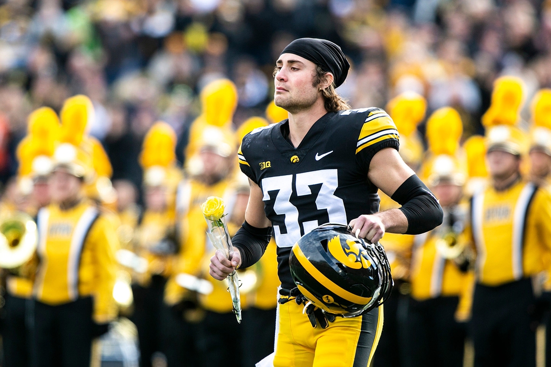Iowa defensive back Riley Moss (33) is acknowledged during a senior day ceremony before a NCAA Big Ten Conference football game against Illinois, Saturday, Nov. 20, 2021, at Kinnick Stadium in Iowa City, Iowa.

211120 Illinois Iowa Fb 064 Jpg