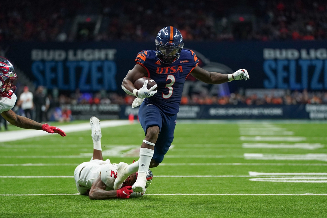 Dec 3, 2021; San Antonio, TX, USA; UTSA Roadrunners running back Sincere McCormick (3) runs for a touchdown in the second half of the 2021 Conference USA Championship Game against the Western Kentucky Hilltoppers at the Alamodome. Mandatory Credit: Daniel Dunn-USA TODAY Sports