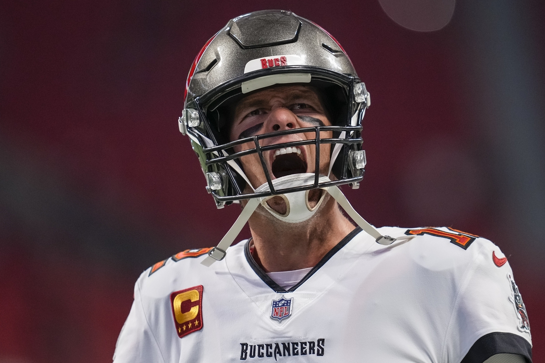 Dec 5, 2021; Atlanta, Georgia, USA; Tampa Bay Buccaneers quarterback Tom Brady (12) reacts on the field prior to the game against the Atlanta Falcons at Mercedes-Benz Stadium. Mandatory Credit: Dale Zanine-USA TODAY Sports