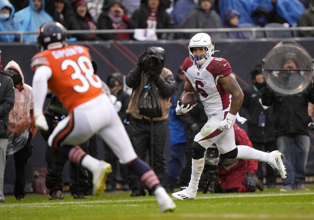 Dec 5, 2021; Chicago, Illinois, USA; Arizona Cardinals running back James Conner (6) makes a catch for a touchdown against the Chicago Bears during the second quarter at Soldier Field. Mandatory Credit: Mike Dinovo-USA TODAY Sports