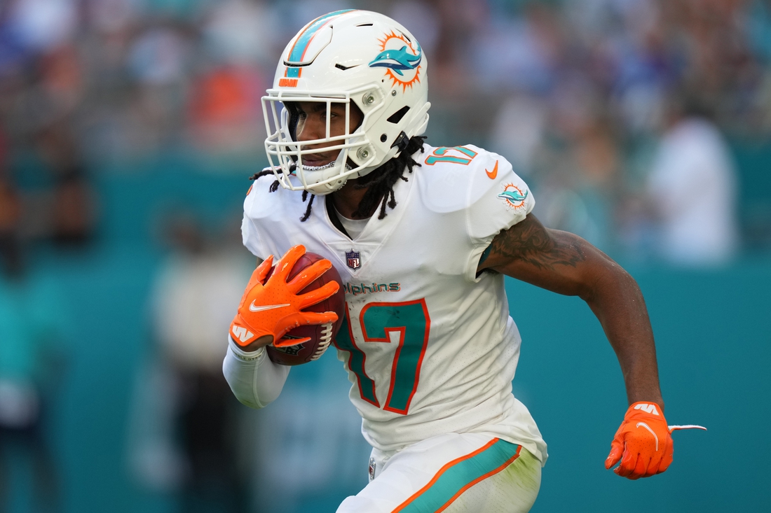 Dec 5, 2021; Miami Gardens, Florida, USA; Miami Dolphins wide receiver Jaylen Waddle (17) runs the ball on a punt return during the second half against the New York Giants at Hard Rock Stadium. Mandatory Credit: Jasen Vinlove-USA TODAY Sports