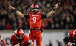 Dec 4, 2021; Cincinnati, Ohio, USA; Cincinnati Bearcats quarterback Desmond Ridder (9) calls a play against the Houston Cougars in the second half during the American Athletic Conference championship game at Nippert Stadium. Mandatory Credit: Katie Stratman-USA TODAY Sports