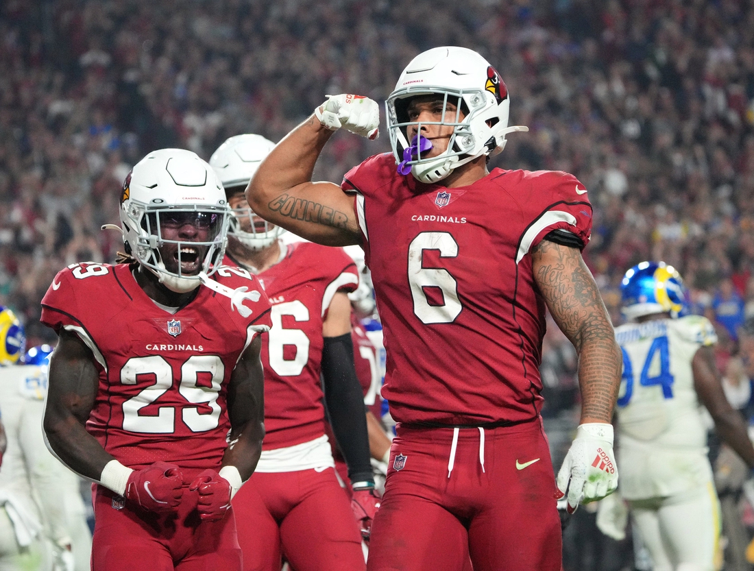 Dec 13, 2021; Glendale, Arizona, USA; Arizona Cardinals running back James Conner (6) celebrates after scoring a rushing touchdown against the Los Angeles Rams during the fourth quarter at State Farm Stadium. Mandatory Credit: Michael Chow-Arizona Republic

Nfl Los Angeles Rams At Arizona Cardinals
