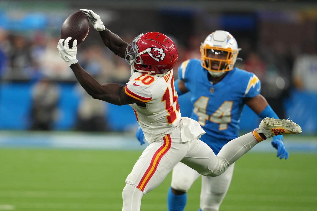 Dec 16, 2021; Inglewood, California, USA; Kansas City Chiefs wide receiver Tyreek Hill (10) catches a pass against the Los Angeles Chargers at SoFi Stadium. Mandatory Credit: Kirby Lee-USA TODAY Sports