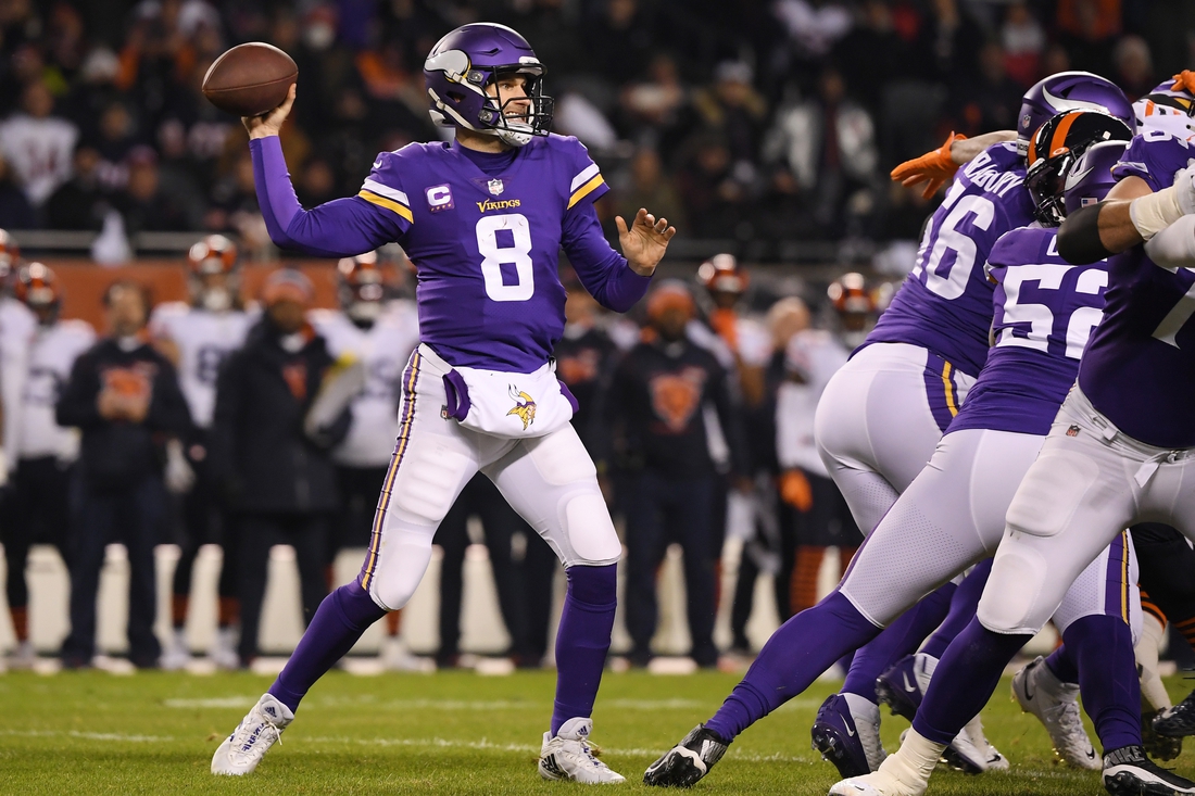 Dec 20, 2021; Chicago, Illinois, USA; Minnesota Vikings quarterback Kirk Cousins (8) passes in the first quarter against the Chicago Bears at Soldier Field. Mandatory Credit: Quinn Harris-USA TODAY Sports