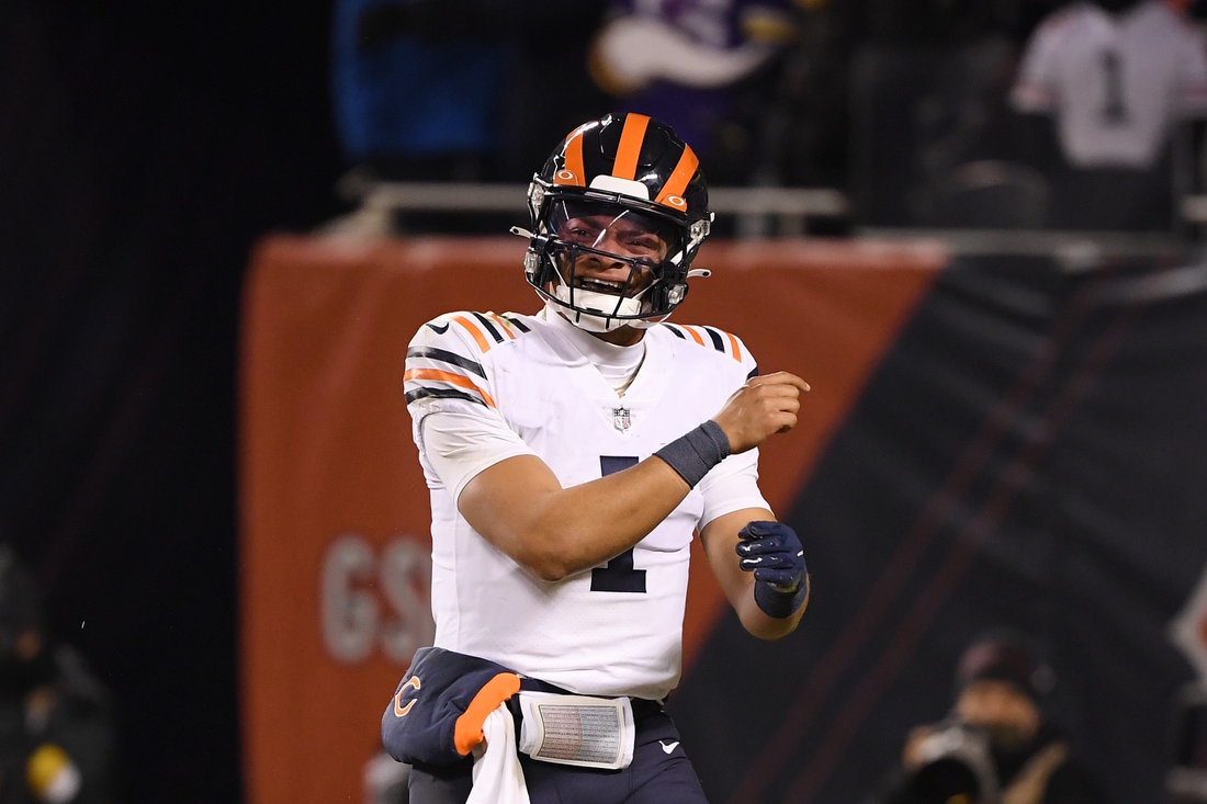 Dec 20, 2021; Chicago, Illinois, USA; Chicago Bears quarterback Justin Fields (1) reacts in the second half against the Minnesota Vikings at Soldier Field. Mandatory Credit: Quinn Harris-USA TODAY Sports