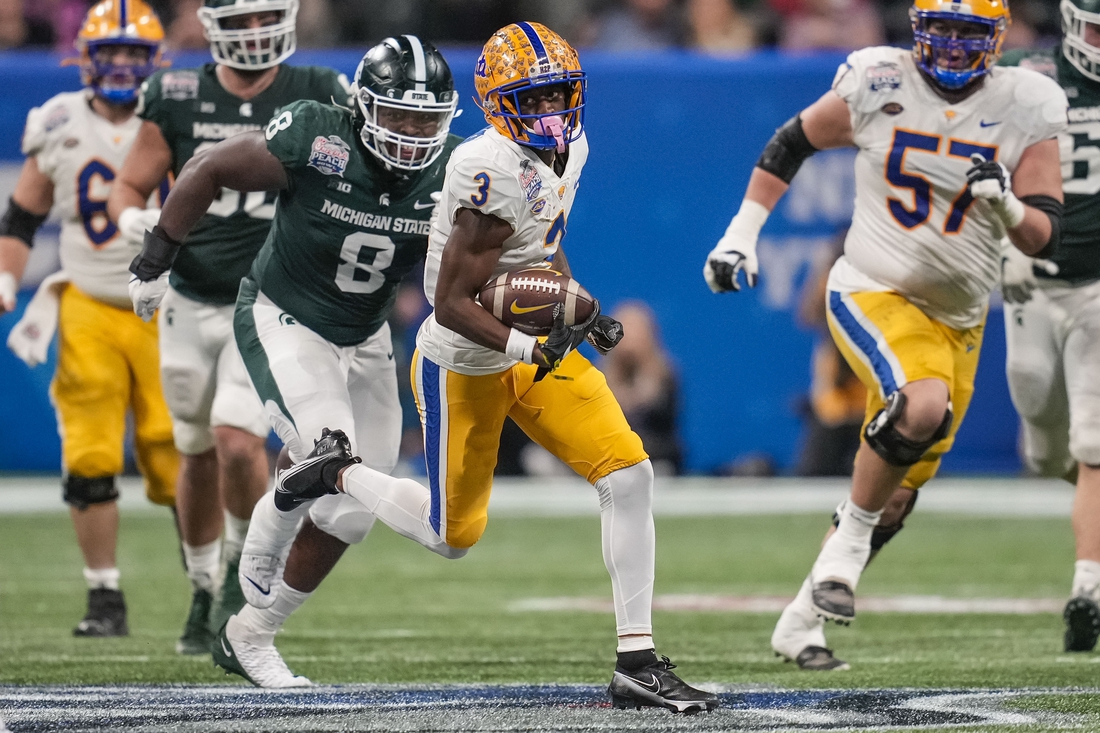 Dec 30, 2021; Atlanta, GA, USA; Pittsburgh Panthers wide receiver Jordan Addison (3) runs with the ball after a catch against the Michigan State Spartans during the first half during the 2021 Peach Bowl at Mercedes-Benz Stadium. Mandatory Credit: Dale Zanine-USA TODAY Sports