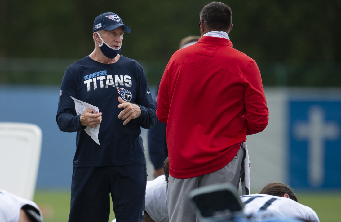Sep 3, 2020; Nashville, TN, USA; Tennessee Titans inside linebackers coach Jim Haslett talks with head coach    Mike Vrabel during practice at Saint Thomas Sports Park Mandatory Credit: George Walker IV/The Tennessean via USA TODAY NETWORK