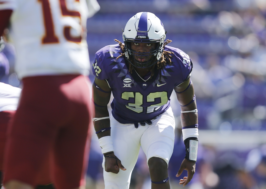 Sep 26, 2020; Fort Worth, Texas, USA; TCU Horned Frogs defensive end Ochaun Mathis (32) on the line of scrimmage in the third quarter against the Iowa State Cyclones at Amon G. Carter Stadium. Mandatory Credit: Tim Heitman-USA TODAY Sports