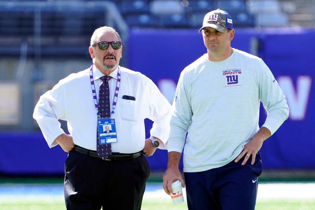 New York Giants general manager Dave Gettleman, left, and head coach Joe Judge talk on the field before the game at MetLife Stadium on Sunday, Sept. 26, 2021, in East Rutherford.

Nyg Vs Atl