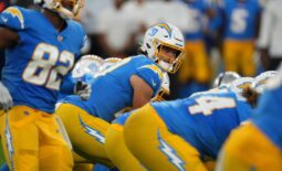 Oct 4, 2021; Inglewood, California, USA; Los Angeles Chargers quarterback Justin Herbert (10) prepares to take the snap against the Las Vegas Raiders at SoFi Stadium. The Chargers defeated the Raiders 28-14. Mandatory Credit: Kirby Lee-USA TODAY Sports