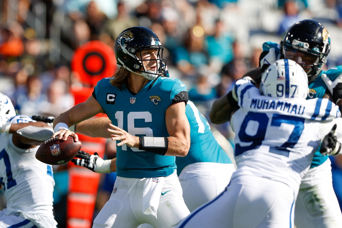Jan 9, 2022; Jacksonville, Florida, USA;  Jacksonville Jaguars quarterback Trevor Lawrence (16) drops back to pass in the second quarter against the Indianapolis Colts at TIAA Bank Field. Mandatory Credit: Nathan Ray Seebeck-USA TODAY Sports