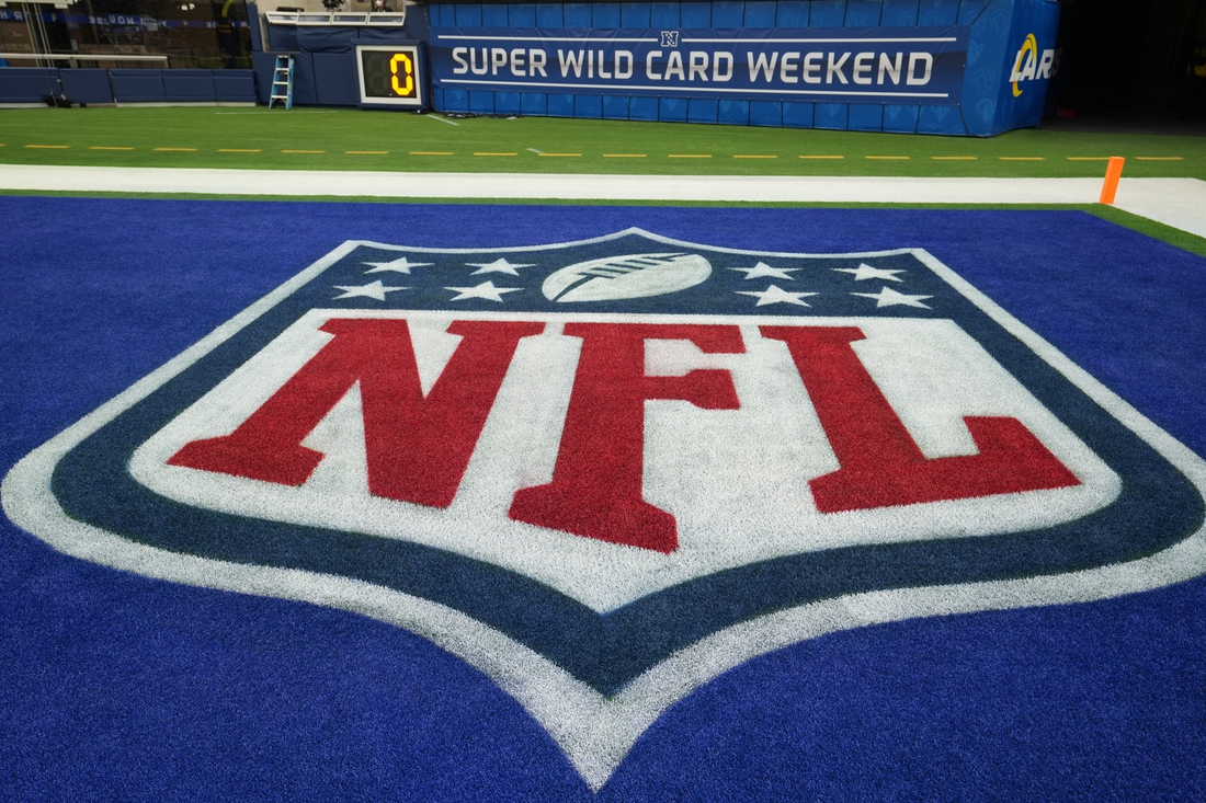 Jan 17, 2022; Inglewood, California, USA; A detailed view of a NFL shield logo in the end zone at a NFC Wild Card playoff football game at SoFi Stadium. Mandatory Credit: Kirby Lee-USA TODAY Sports