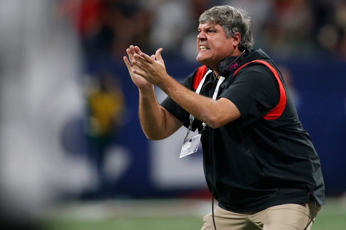 Georgia offensive line coach Matt Luke on the sideline during the first half of the Southeastern Conference championship NCAA college football game between Georgia and Alabama in Atlanta, on Saturday, Dec. 4, 2021.

News Joshua L Jones