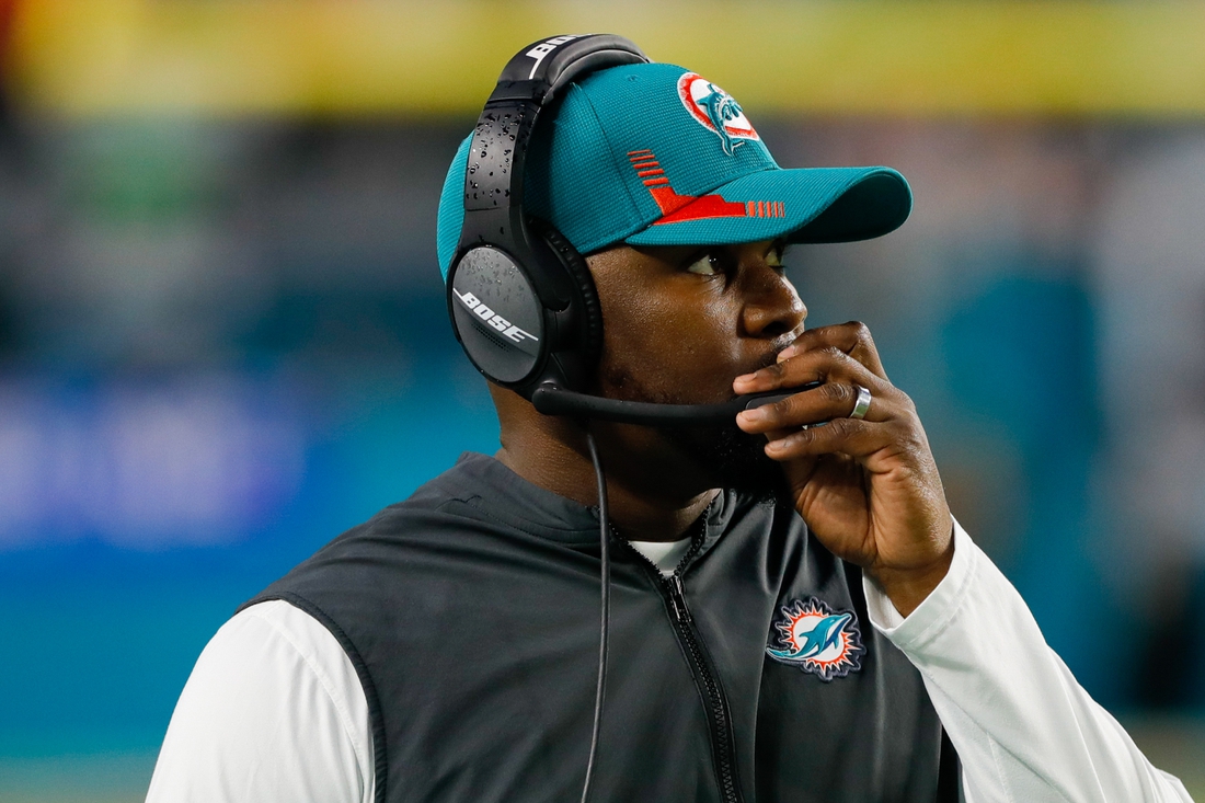 Jan 9, 2022; Miami Gardens, Florida, USA; Miami Dolphins head coach Brian Flores watches from the sideline during the second quarter of the game against the New England Patriots at Hard Rock Stadium. Mandatory Credit: Sam Navarro-USA TODAY Sports