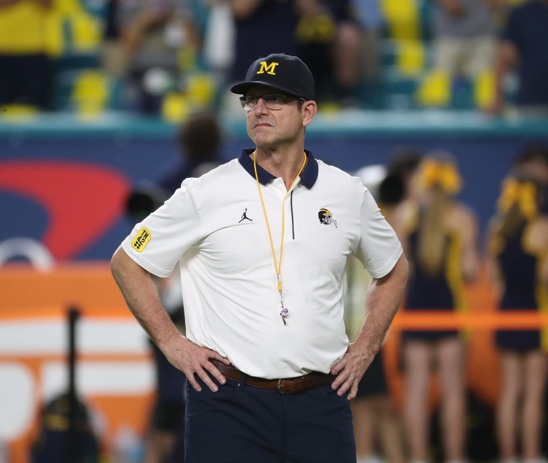 Michigan coach Jim Harbaugh watched his team warm up before the Orange Bowl against Georgia on Friday, Dec. 31, 2021, in Miami Gardens, Florida.

Capital One Orange Bowl